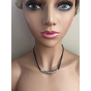 Brighton scrolled design necklace with black Leather Cord. Silver Plated